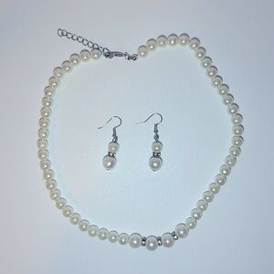 Costume pearls with drop earrings